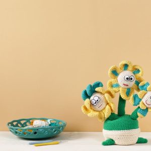 Bloemenfamilie in potje